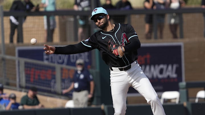 Arizona Diamondbacks shortstop Jordan Lawlar (10) throws to first against the Cleveland Guardians during a spring training game at Salt River Fields on Feb. 24, 2025.