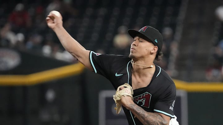 Arizona Diamondbacks pitcher Justin Martinez (63) throws against the Tampa Bay Rays during the eighth inning at Chase Field on April 23, 2025.