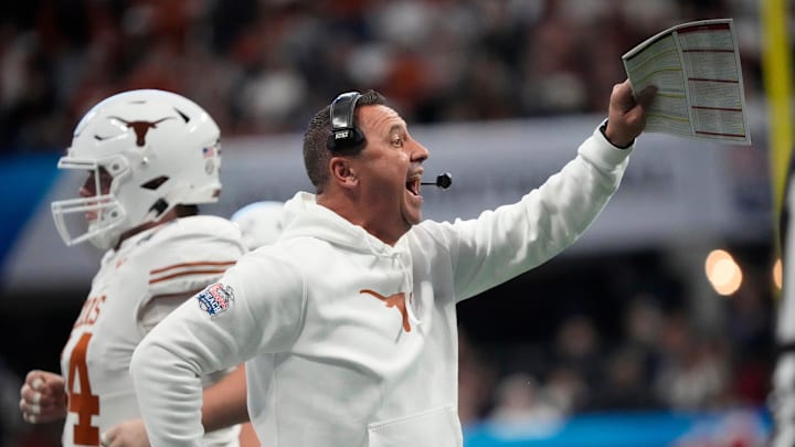 Texas head coach Steve Sarkisian directs his player against Arizona State during the second quarter of the Chick-fil-A Peach Bowl in Atlanta on Wednesday, Jan. 1, 2025. Texas head coach Steve Sarkisian directs his player against Arizona State during the second quarter of the Chick-fil-A Peach Bowl in Atlanta on Wednesday, Jan. 1, 2025.