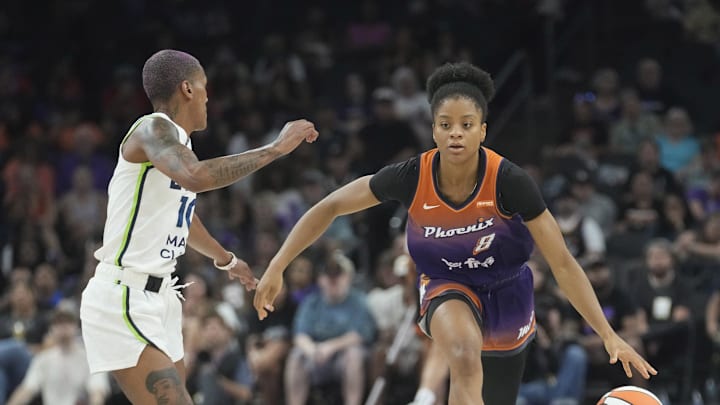 Phoenix Mercury guard Monique Akoa Makani (8) is defended by Minnesota Lynx guard Courtney Williams (10) during the first quarter at PHX Arena on July 9, 2025. Phoenix Mercury guard Monique Akoa Makani (8) is defended by Minnesota Lynx guard Courtney Williams (10) during the first quarter at PHX Arena on July 9, 2025.