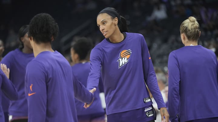 Phoenix Mercury forward DeWanna Bonner (14) warms up before playing against the Minnesota Lynx at PHX Arena on July 9, 2025. Phoenix Mercury forward DeWanna Bonner (14) warms up before playing against the Minnesota Lynx at PHX Arena on July 9, 2025.