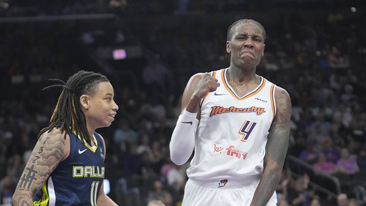 Phoenix Mercury forward Natasha Mack (4) celebrates after blocking a shot by Dallas Wings guard JJ Quinerly (11) during the second quarter at PHX Arena on July 7, 2025.