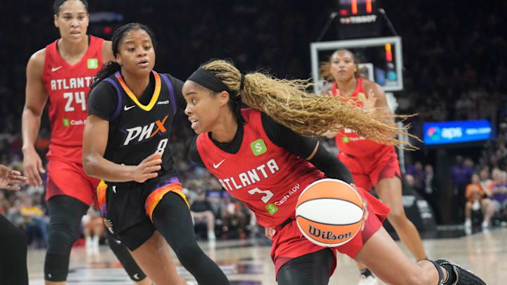Atlanta Dream guard Jordin Canada (3) drives against Phoenix Mercury guard Monique Akoa Makani (8) during the first quarter at PHX Arena Aug 10, 2025.