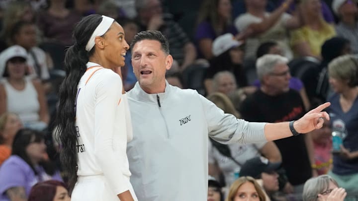 Phoenix Mercury head coach Nate Tibbetts talks to forward DeWanna Bonner (14) during the fourth quarter against the Connecticut Sun in Phoenix, at PHX Arena on Aug 5, 2025.