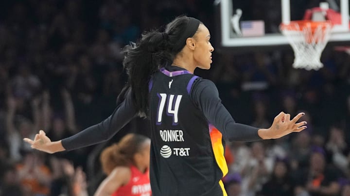 Phoenix Mercury forward DeWanna Bonner (14) celebrates a three point basket against the Atlanta Dream during the first quarter at PHX Arena Aug 10, 2025.