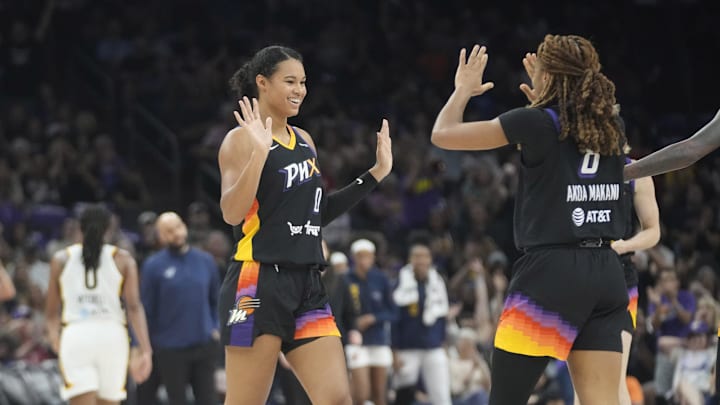 Phoenix Mercury forward Satou Sabally (0) celebrates after a basket with Phoenix Mercury guard Monique Akoa Makani (8) against the Indiana Fever during the second quarter at PHX Arena on Sept. 2, 2025.