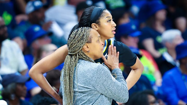 Teresa Weatherspoon and Angel Reese. 