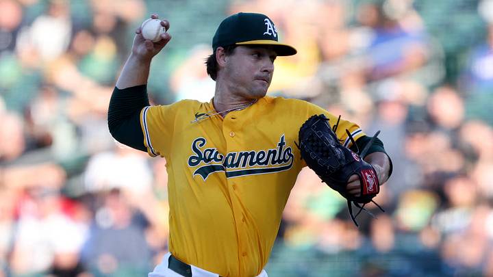 Aug 15, 2026; West Sacramento, California, USA; Athletics starting pitcher J.T. Ginn (35) throws a pitch against the Texas Rangers during the first inning at Sutter Health Park. Mandatory Credit: Dennis Lee-Imagn Images