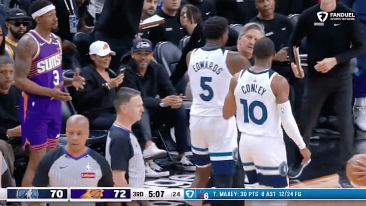 Suns guard Beal reacts to Timberwolves coach Finch getting thrown out of the game.