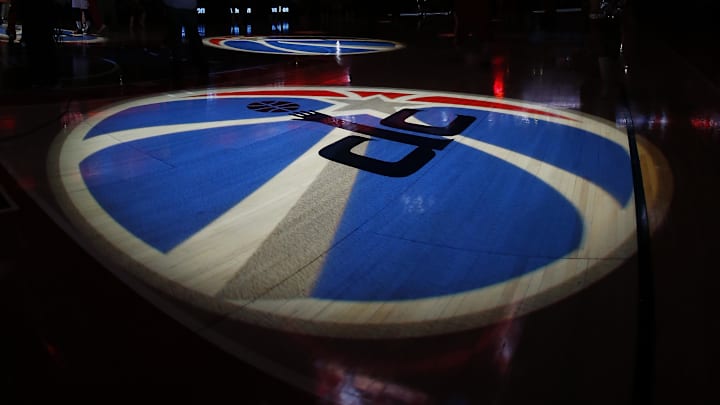 Apr 9, 2014; Washington, DC, USA; Washington Wizards logos are projected on the court during player intros prior to the Wizards' game against the Charlotte Bobcats at Verizon Center. The Bobcats won 94-88 in overtime. Mandatory Credit: Geoff Burke-Imagn Images