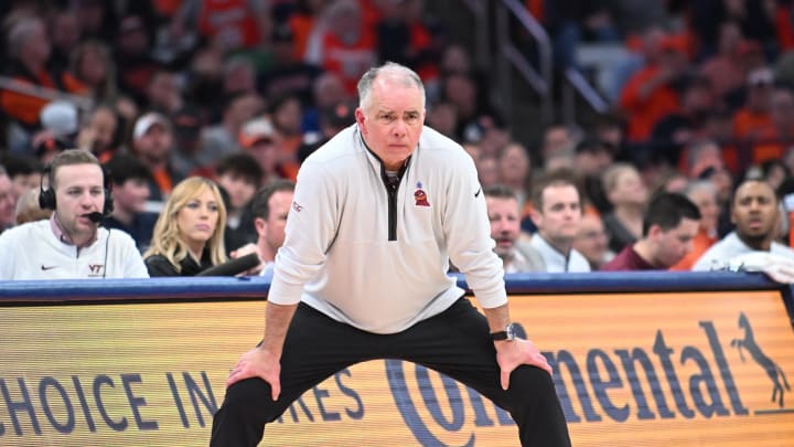 Feb 27, 2024; Syracuse, New York, USA; Virginia Tech Hokies head coach Mike Young watches a play against the Syracuse Orange in the second half at the JMA Wireless Dome. Mandatory Credit: Mark Konezny-USA TODAY Sports
