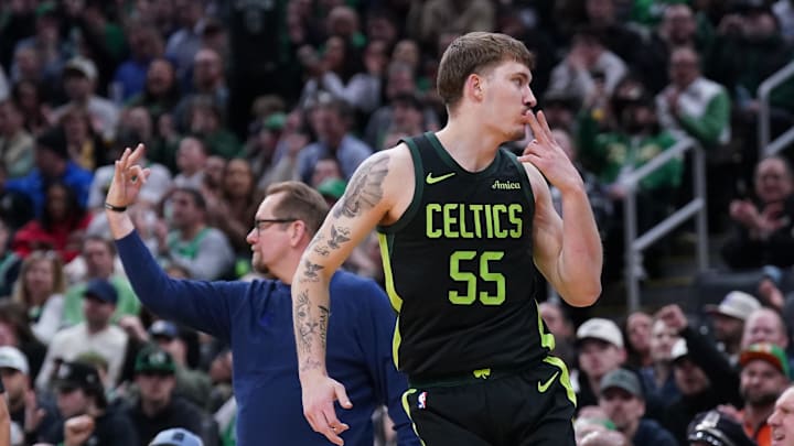 Mar 6, 2025; Boston, Massachusetts, USA; Boston Celtics forward Baylor Scheierman (55) reacts after his three point basket along with Philadelphia 76ers head coach Nick Nurse in the second half at TD Garden. Mandatory Credit: David Butler II-Imagn Images