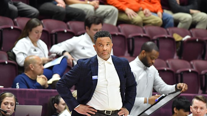 Jan 27, 2026; Blacksburg, Virginia, USA;  Georgia Tech Yellow Jackets head coach Damon Stoudamire looks at the scoreboard during the second half at Cassell Coliseum. Mandatory Credit: Brian Bishop-Imagn Images