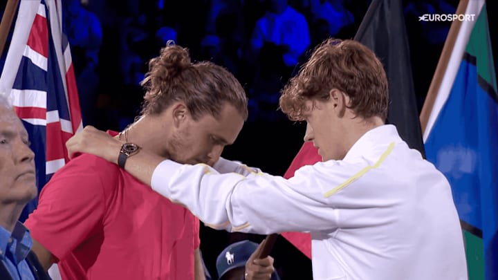 Jannik Sinner comforts Alexander Zverev after the Australian Open Final.