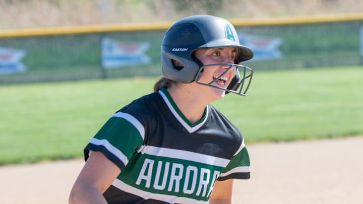 Aurora's Sophie Retton rounds the bases after a home run.
