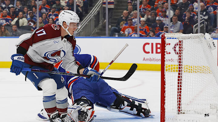 Colorado Avalanche forward Parker Kelly (17) scores a short-handed goal on Edmonton Oilers goaltender Calvin Pickard (30)