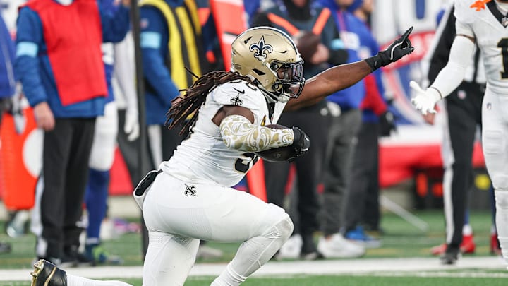 Dec 8, 2024; East Rutherford, New Jersey, USA; New Orleans Saints linebacker Demario Davis (56) celebrates his interception during the second half against the New York Giants at MetLife Stadium. Mandatory Credit: Vincent Carchietta-Imagn Images