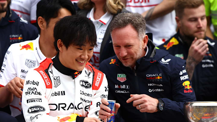 [US, Mexico & Canada customers only] April 6, 2025; Suzuka, JAPAN; Yuki Tsunoda with team principal Christian Horner during Red Bull team celebration photo op after Max Verstappen (not pictured) won the F1 Japanese Grand Prix at Suzuka Circuit. Mandatory Credit: Issei Kato/Reuters via Imagn Images