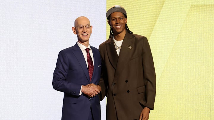 Jun 26, 2024; Brooklyn, NY, USA; Cody Williams poses for photos with NBA commissioner Adam Silver after being selected in the first round by the Utah Jazz in the 2024 NBA Draft at Barclays Center. Mandatory Credit: Brad Penner-Imagn Images Jun 26, 2024; Brooklyn, NY, USA; Cody Williams poses for photos with NBA commissioner Adam Silver after being selected in the first round by the Utah Jazz in the 2024 NBA Draft at Barclays Center. Mandatory Credit: Brad Penner-Imagn Images