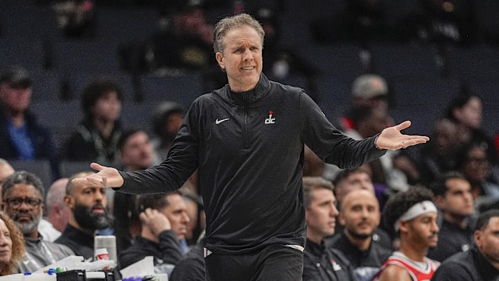 Feb 3, 2025; Charlotte, North Carolina, USA;Washington Wizards head coach Brian Keefe reacts to a call during the second half against the Charlotte Hornets at Spectrum Center. Mandatory Credit: Jim Dedmon-Imagn Images