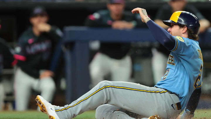 Apr 17, 2026; Miami, Florida, USA; Milwaukee Brewers second baseman Brice Turang (2) scores against the Miami Marlins during the tenth inning at loanDepot Park. Mandatory Credit: Sam Navarro-Imagn Images