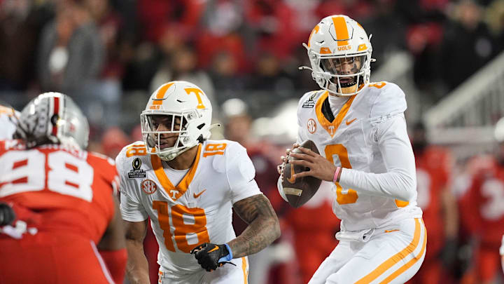 Tennessee quarterback Nico Iamaleava (8) looks for an open receiver during the NCAA college football playoff game against Ohio State on Saturday, Dec. 21, 2024, in Columbus, Ohio. Tennessee quarterback Nico Iamaleava (8) looks for an open receiver during the NCAA college football playoff game against Ohio State on Saturday, Dec. 21, 2024, in Columbus, Ohio.