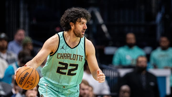 Jan 25, 2025; Charlotte, North Carolina, USA; Charlotte Hornets guard Vasilije Micic (22) controls the ball against the New Orleans Pelicans during the third quarter at Spectrum Center. Mandatory Credit: Scott Kinser-Imagn Images