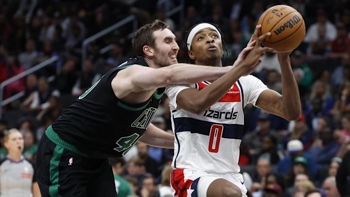 Oct 24, 2024; Washington, District of Columbia, USA; Washington Wizards guard Bilal Coulibaly (0) drives to the basket as Boston Celtics center Luke Kornet (40) defends in the second half at Capital One Arena. Mandatory Credit: Geoff Burke-Imagn Images Oct 24, 2024; Washington, District of Columbia, USA; Washington Wizards guard Bilal Coulibaly (0) drives to the basket as Boston Celtics center Luke Kornet (40) defends in the second half at Capital One Arena. Mandatory Credit: Geoff Burke-Imagn Images