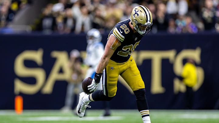 Dec 10, 2023; New Orleans, Louisiana, USA; New Orleans Saints linebacker Pete Werner (20) reacts to recovering a fumble by Carolina Panthers quarterback Bryce Young (9) during the first half at the Caesars Superdome. Mandatory Credit: Stephen Lew-Imagn Images