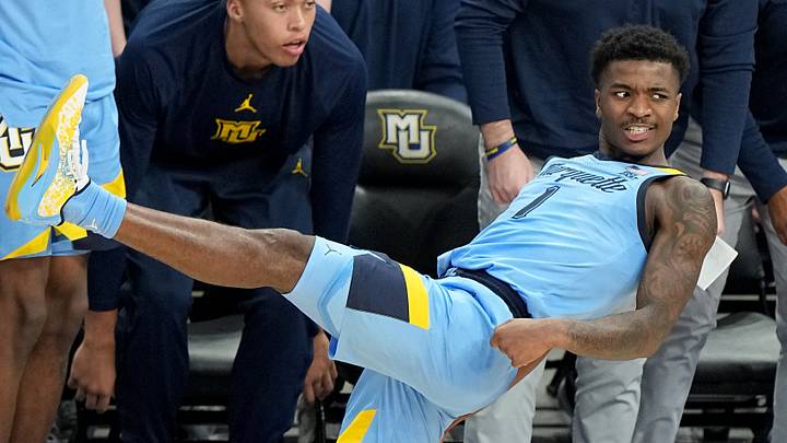 Marquette guard Kam Jones (1) watches his shot miss during the second half of their game Wednesday, December 6, 2023 at Fiserv Forum in Milwaukee, Wisconsin. Marquette beat Texas 86-65.