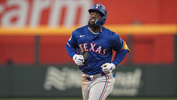 Apr 21, 2024; Cumberland, Georgia, USA; Texas Rangers right fielder Adolis Garcia (53)  runs the bases after hitting a two run home run against the Atlanta Braves during the eighth inning at Truist Park. Mandatory Credit: Dale Zanine-USA TODAY Sports
