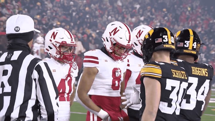 Nebraska players deny Iowa's handshakes before their game.
