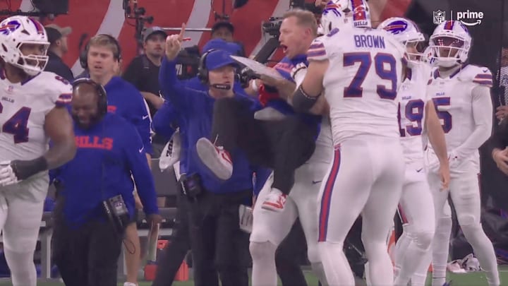 Bills special teams coordinator Chris Tabor got some air after a kickoff return touchdown
