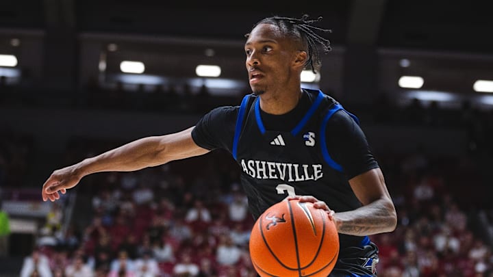 Nov 4, 2024; Tuscaloosa, Alabama, USA; North Carolina-Asheville Bulldogs guard Jordan Marsh (2) drives the ball down the court against the Alabama Crimson Tide during the second half at Coleman Coliseum. Mandatory Credit: Will McLelland-Imagn Images Nov 4, 2024; Tuscaloosa, Alabama, USA; North Carolina-Asheville Bulldogs guard Jordan Marsh (2) drives the ball down the court against the Alabama Crimson Tide during the second half at Coleman Coliseum. Mandatory Credit: Will McLelland-Imagn Images