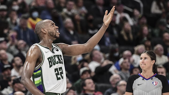 Dec 1, 2021; Milwaukee, Wisconsin, USA; Milwaukee Bucks forward Khris Middleton (22) reacts after a foul call in the second quarter during the game against the Charlotte Hornets at Fiserv Forum. Mandatory Credit: Benny Sieu-Imagn Images