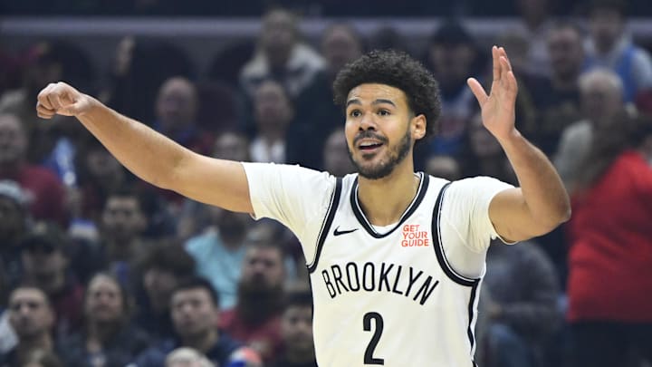 Mar 11, 2025; Cleveland, Ohio, USA; Brooklyn Nets forward Cameron Johnson (2) reacts in the first quarter against the Cleveland Cavaliers at Rocket Arena. Mandatory Credit: David Richard-Imagn Images