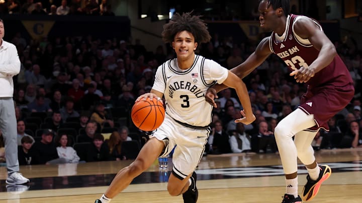 Feb 14, 2026; Nashville, Tennessee, USA;  Vanderbilt Commodores guard Tyler Tanner (3) drives baseline against the Texas A&M Aggies during the second half at Memorial Gymnasium. Mandatory Credit: Steve Roberts-Imagn Images