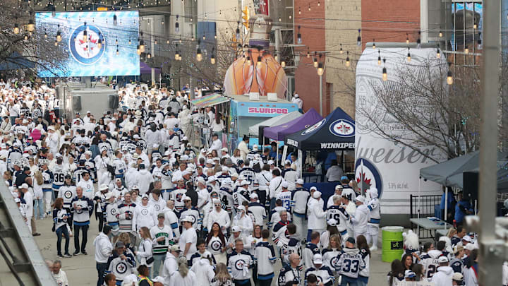 Apr 21, 2025; Winnipeg, Manitoba, CAN; Fans gather outside the Canada Life Centre for the White Out Party before a game between the Winnipeg Jets and the St. Louis Blues in game two of the first round of the 2025 Stanley Cup Playoffs. Mandatory Credit: James Carey Lauder-Imagn Images Apr 21, 2025; Winnipeg, Manitoba, CAN; Fans gather outside the Canada Life Centre for the White Out Party before a game between the Winnipeg Jets and the St. Louis Blues in game two of the first round of the 2025 Stanley Cup Playoffs. Mandatory Credit: James Carey Lauder-Imagn Images