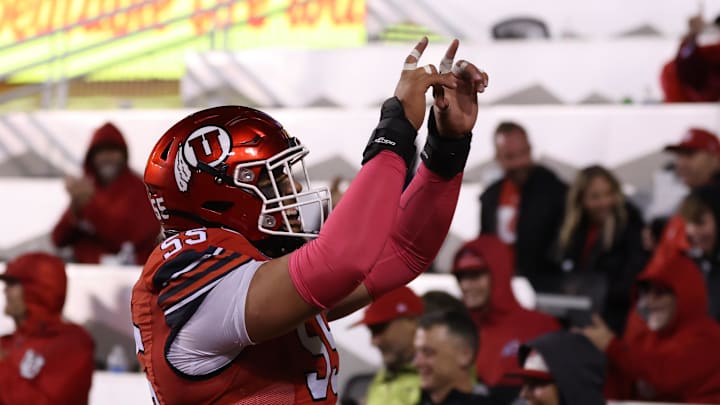 Utah Utes offensive lineman Spencer Fano (55) celebrates a touchdown against the Arizona State Sun Devils during the third quarter at Rice-Eccles Stadium. Utah Utes offensive lineman Spencer Fano (55) celebrates a touchdown against the Arizona State Sun Devils during the third quarter at Rice-Eccles Stadium.