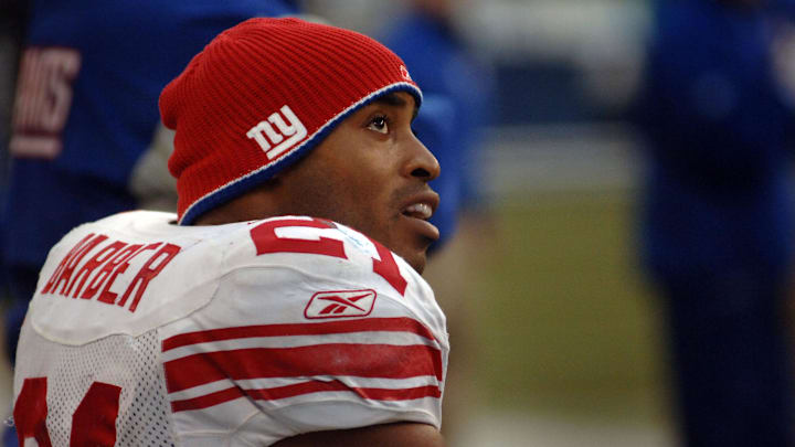 Nov. 27, 2005; Seattle, WA, USA; New York Giants running back (21) Tiki Barber against the Seattle Seahawks at Qwest Field in Seattle, Washington. Mandatory Credit: Mark J. Rebilas-Imagn Images © 2005 Mark J. Rebilas