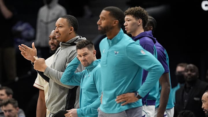 Mar 31, 2025; Charlotte, North Carolina, USA; Charlotte Hornets forward Grant Williams (2) cheers on his teammates from the bench during the second half against the Utah Jazz  at Spectrum Center. Mandatory Credit: Jim Dedmon-Imagn Images