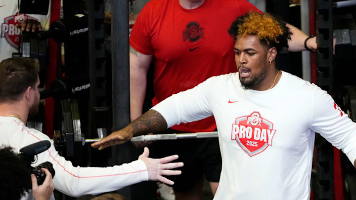 Ohio State Buckeyes offensive lineman Josh Simmons gets high fives after lifting during the pro day for NFL scouts at the Woody Hayes Athletic Cente on March 26, 2025.