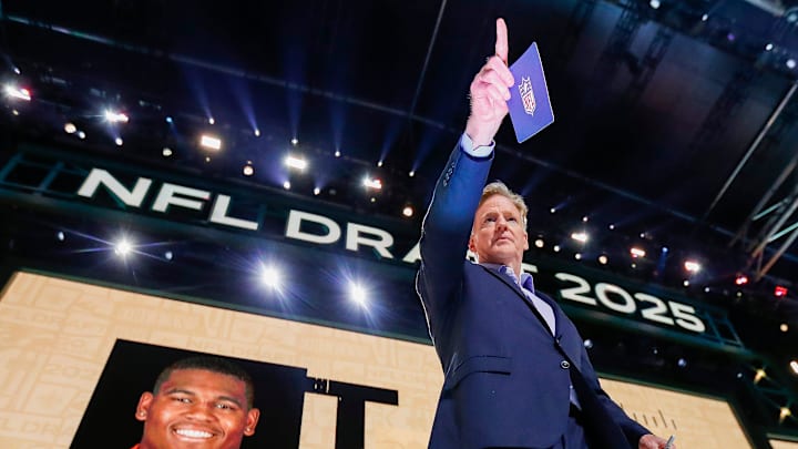 NFL Commissioner Roger Goodell points to a fan in the crowd at the 2025 NFL Draft.