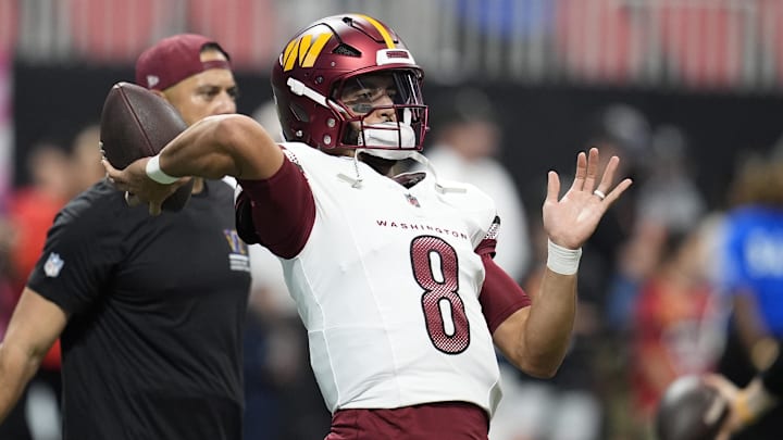 Sep 28, 2025; Atlanta, Georgia, USA; Washington Commanders quarterback Marcus Mariota (8) warms up before a game against the Atlanta Falcons at Mercedes-Benz Stadium. Mandatory Credit: Dale Zanine-Imagn Images