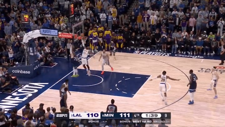James swats DiVincenzo in the fourth quarter between the Lakers and Timberwolves