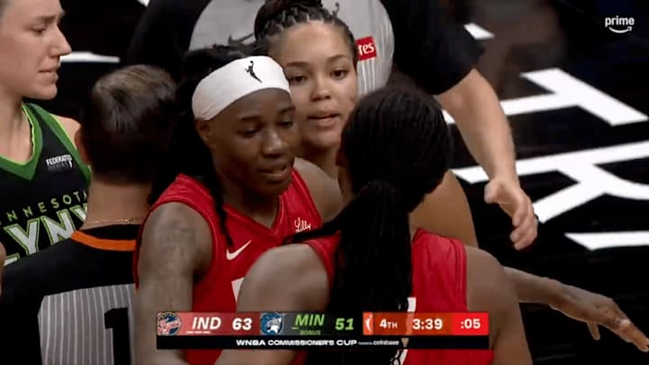 Fever forward Howard separates Boston and Collier during the WNBA Commissioner's Cup final