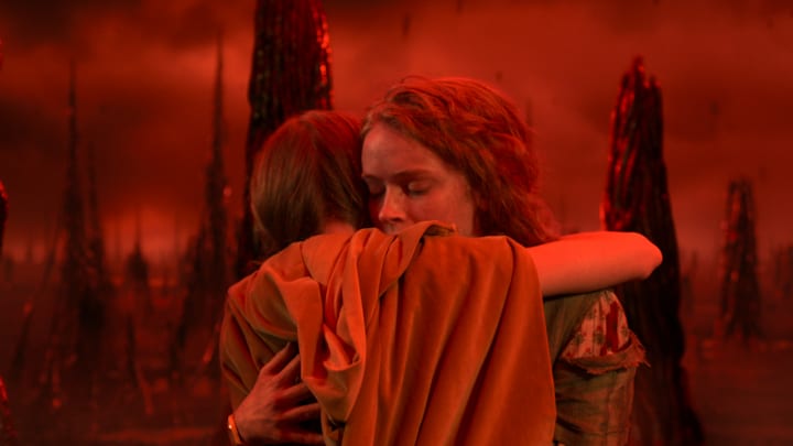 Nell Fisher as Holly Wheeler and Sadie Sink as Max Mayfield in Stranger Things: Season 5. 