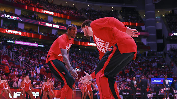 Feb 21, 2025; Houston, Texas, USA; Houston Rockets guard Jalen Green (4) and center Alperen Sengun (28) greet each other before the game against the Minnesota Timberwolves at Toyota Center. Mandatory Credit: Troy Taormina-Imagn Images