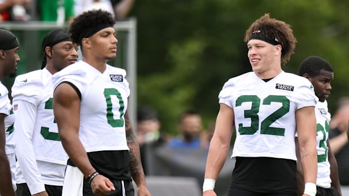 Jul 25, 2024; Florham Park, NJ, USA; New York Jets running back Isaiah Davis (32) chats with running back Braelon Allen (0) during training camp at Atlantic Health Jets Training Center. Mandatory Credit: John Jones-Imagn Images Jul 25, 2024; Florham Park, NJ, USA; New York Jets running back Isaiah Davis (32) chats with running back Braelon Allen (0) during training camp at Atlantic Health Jets Training Center. Mandatory Credit: John Jones-Imagn Images