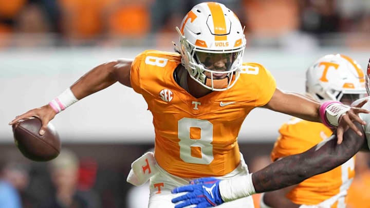 Oct 12, 2024; Knoxville, Tennessee, USA; Tennessee Volunteers quarterback Nico Iamaleava (8) scrambles with the ball against the Florida Gators at Neyland Stadium. Mandatory Credit: Brianna Paciorka/USA TODAY Network via Imagn Images